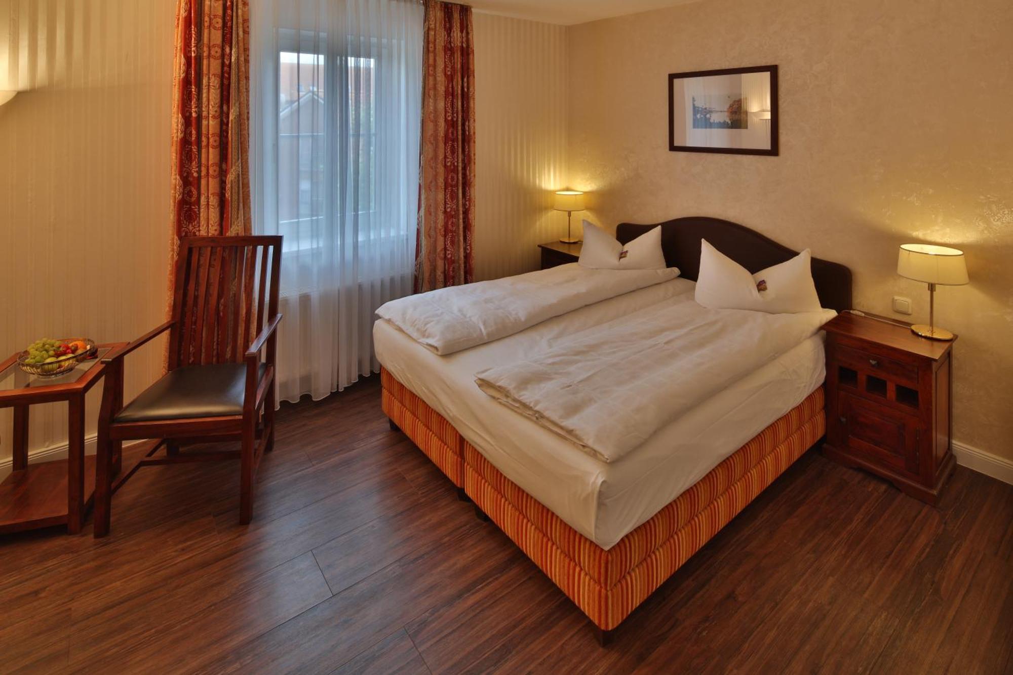 Hotel Elefant Шверин Стая снимка
