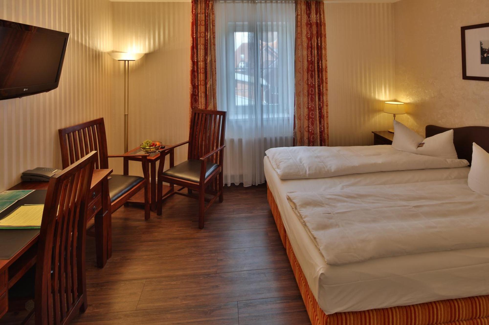 Hotel Elefant Шверин Стая снимка
