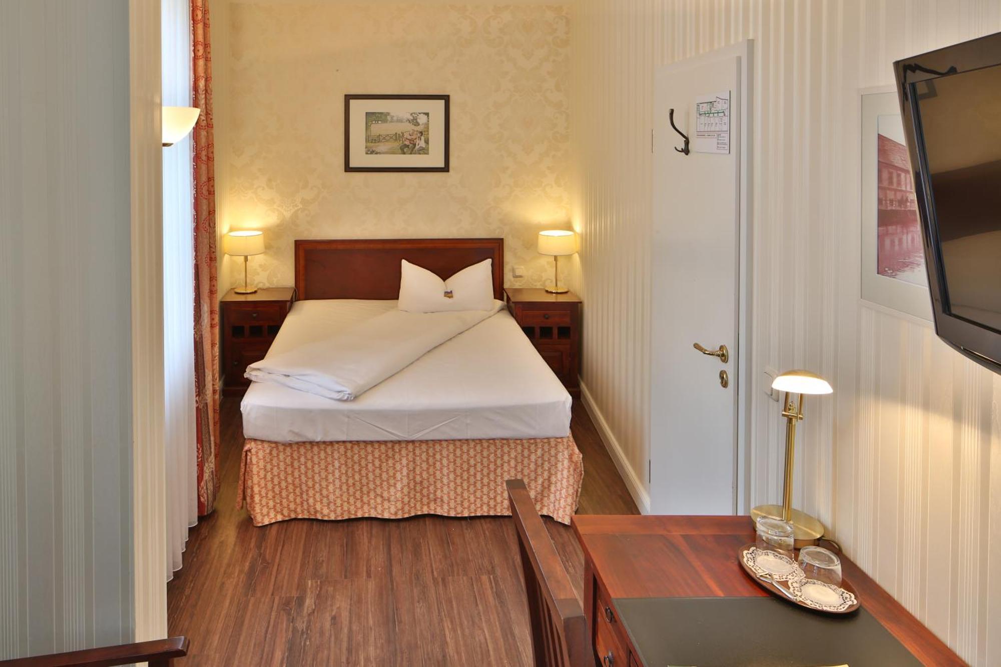 Hotel Elefant Шверин Стая снимка