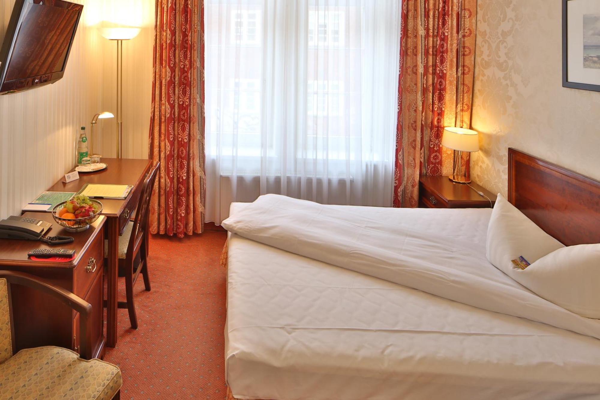 Hotel Elefant Шверин Стая снимка