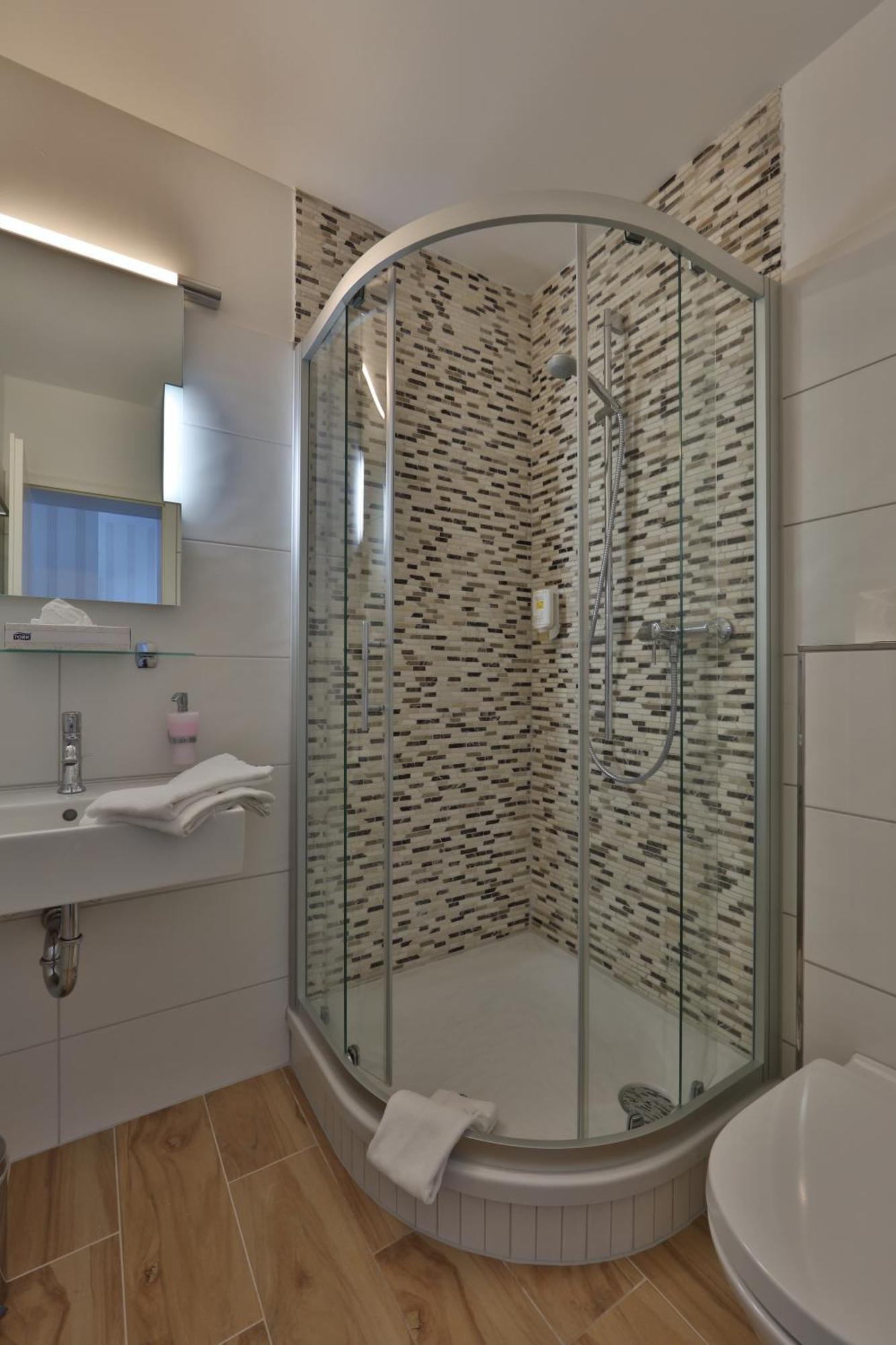 Hotel Elefant Шверин Стая снимка