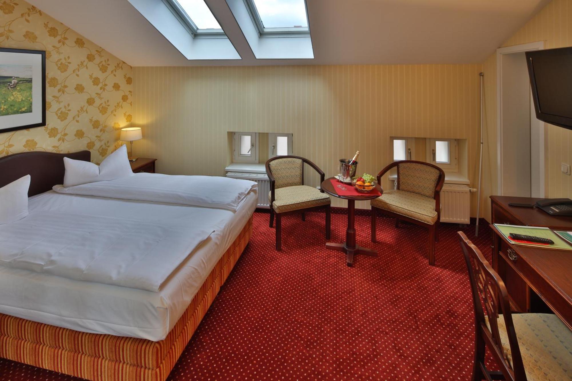 Hotel Elefant Шверин Стая снимка