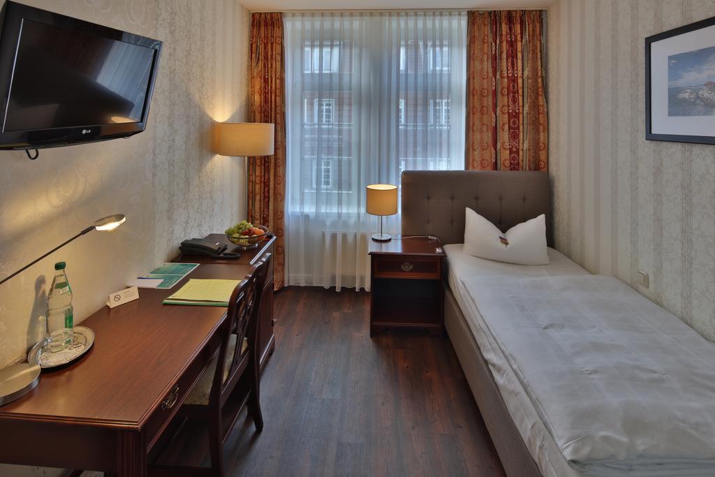 Hotel Elefant Шверин Стая снимка